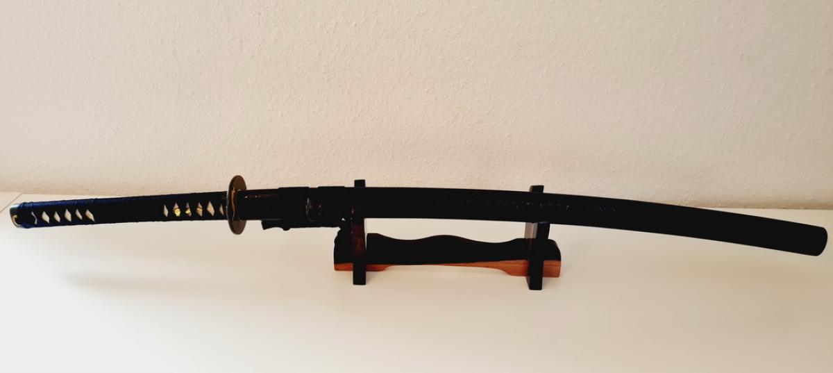 Table weapon stand for 1 sword made of ebony ➤ www.bokken-shop.de »suitable for Aikdio, Jodo, Bujinkan, Jodo, Ju-Jutsu - your Budo specialist dealer!